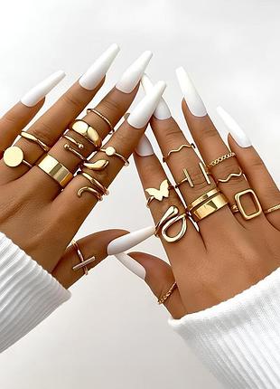 Набір круглих геометричних кілець у вигляді метеликів та змій 20 штук, біжутерія золотого кольору.