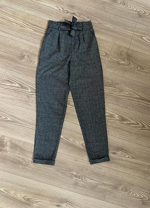 Штани в клітинку