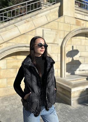 Пухова жилетка з норкою