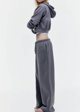 Штани широкі на шнурку з начосом утеплені джогери трикотаж утеплені широкі рівні шиани штаны теплые с начесом