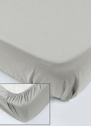 Сіре трикотажне простирадло на гумці 80х160