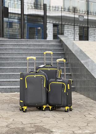 Большой чемодан дорожный тканевый нейлон l польша на колесах wings с подшипником