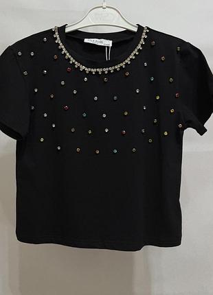 Футболка в камінці