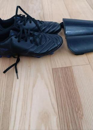 Бутси kipsta і щитки 3