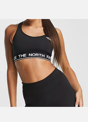 Спортивный топ черный женский the north face women's training tech medium support sports bra