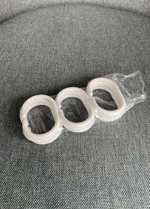 Кільця білі пластикові для шторки в душ