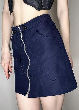 Спортивна вінтажна міні спідниця