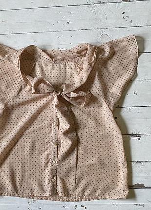 Вінтажна блуза в дрібний горошок з бантом