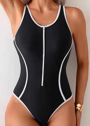 Чорний суцільний купальник великого 20 розміру