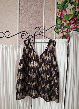 Красива чорна блуза з принтом паєтки evans.