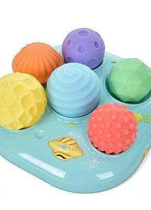 Дитяча розвиваюча "текстурні м'ячики" 35179m  6 штук, музика, світло