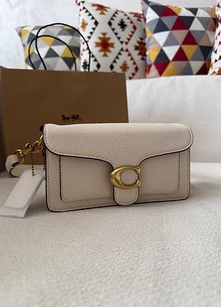 Сумка coach молочного кольору з довгим ремінцем