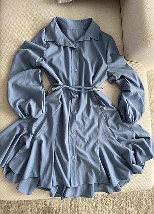 Сукня плаття  голубого кольору з рукавом