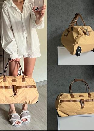 Дорожня сумка саквояж на колесах валіза чемодан