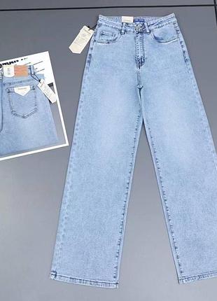Жіночі блакитні стрейчеві джинси труби прямого кр збільшених розмірів
