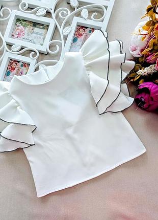 Біла нарядна блуза в школу