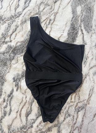 Чорний суцільний купальник