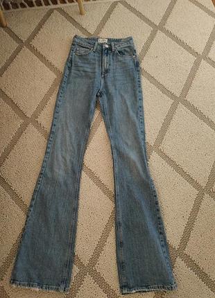Джинсы клеш