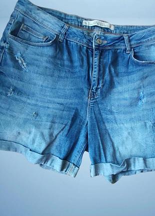 Джинсові світлі шорти 32 розмір