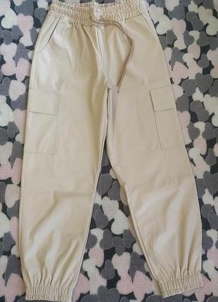 Бежеві штани джогери з екошіри р.46/48, 50/52