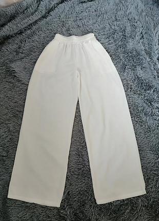 Длинные широкие летние полупрозрачные брюки палаццо высокая посадка