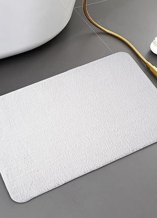 Килимок для ванни та душу bathlux м'який тканинний прогумований, нековзкий білий