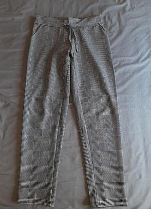 Брюки в клетку