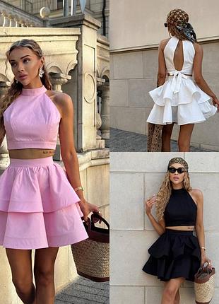 Жіночий костюм з топом і спідницею