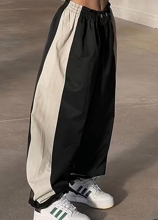 Широкие комбинированные спортивные штаны в стиле streetwear