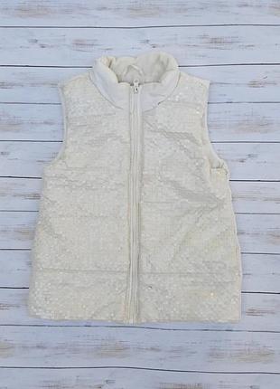 Дівчача біла жилетка з паєтками