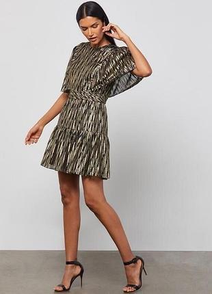 Сукня з рюшами