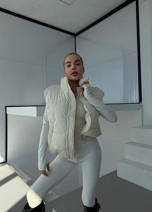 Женская жилетка