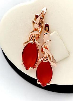 Позолочені сережки з червоними цирконіями фірма fallon (медичне золото)
