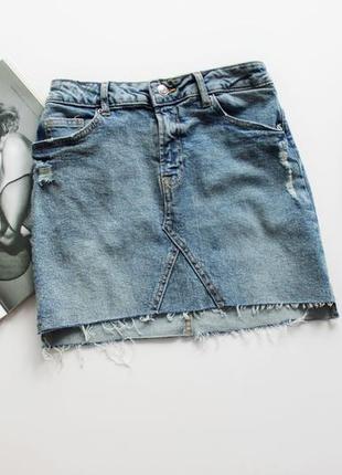Коротка джинсова спідниця з потертостями хс 63 фото