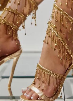 Золоті босоніжки з бахромою камні стрази