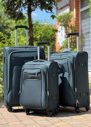 Большой чемодан дорожный тканевый l польша на колесах wings с подшипником