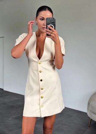 Сукня коротка з декольте ґудзиками кремова