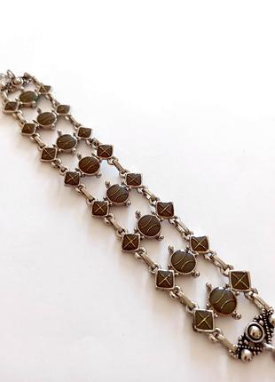 Стильный трехрядный женский браслет