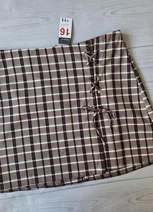 Спідниця в клітинку з шнурівкою