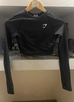 Топ з довгими рукавами і виємкою для пальців .gymshrark .розмір xs.(примітка,краще для дівчат з грудьми 1-1,5.якщо більше топ буде підвертатись)