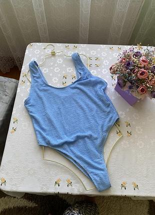 Актуальний суцільний купальник в рубчик великого розміру