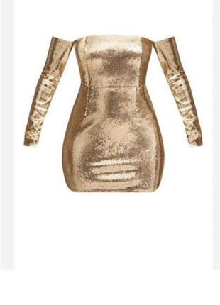 Плаття золотого кольору в паєтки