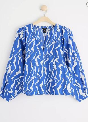 Блуза с объемными рукавами