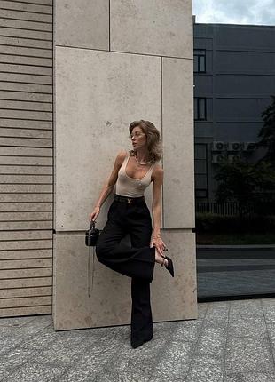 Жіночі брюки палаццо з костюмного крепу чорні молочні