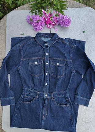 Жіночий джинсовий комбінезон