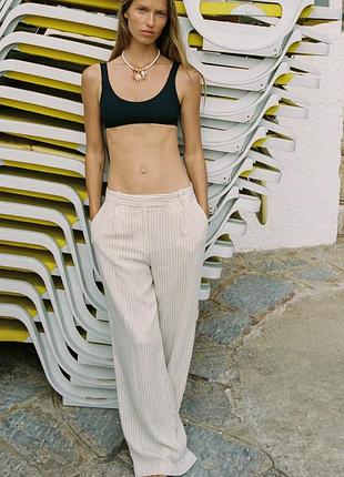 Широкі світло сірі в чорну смужку штани z@ra. вшивні кармани з переду, імітовані ззаду. тканина  81% віскоза, 17% льон, 2% п/е. нові❤️