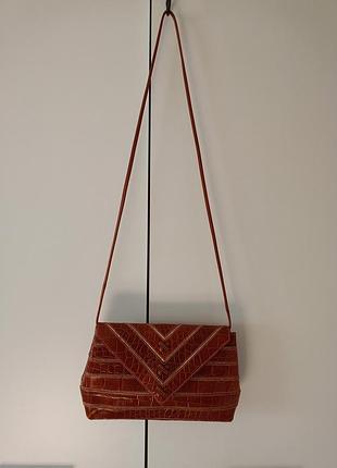 Кожаная сумка кросс-боди от итальянского бренда braccialini