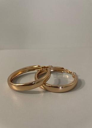 Сережки кільця в рожевому золоті