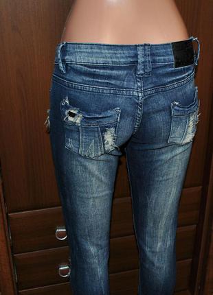 Рваные джинсы женские urban surface м с3 фото