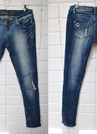 Рваные джинсы женские urban surface м с4 фото